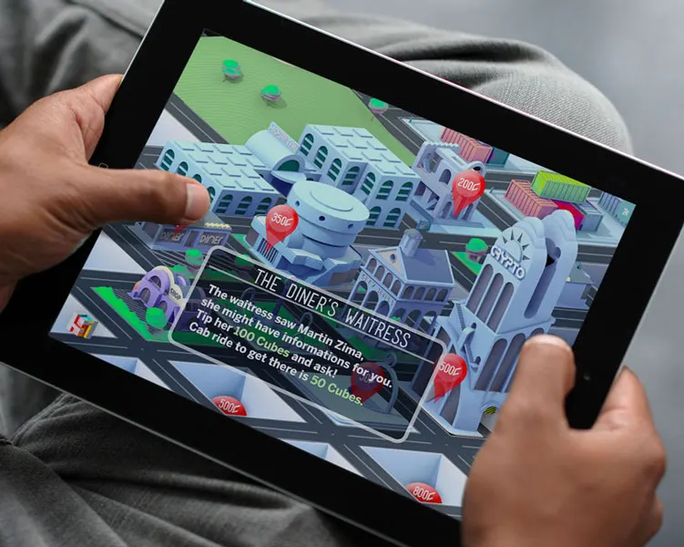 Student holding a tablet that shows the isometric city game