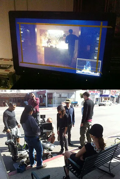 Video shoot: monitor playback and a crew filming on the street
